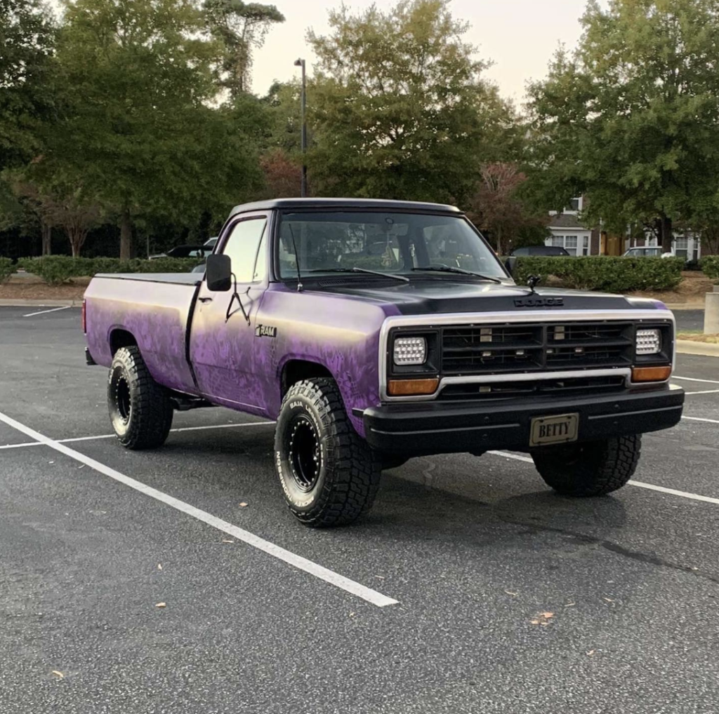 Pickup truck with purple vinyl wrap
