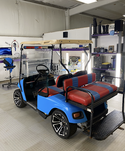 Blue and red wrapped golf cart